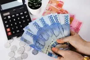 bali currency to usd
